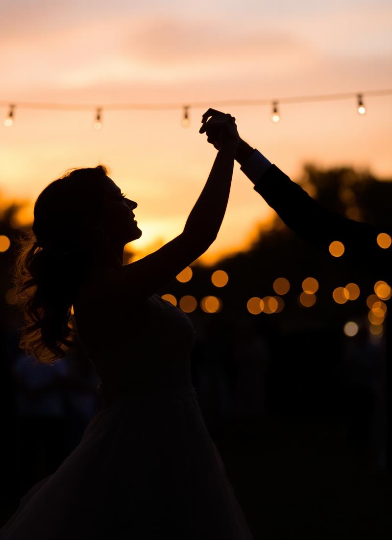 Couple dancing at sunset
